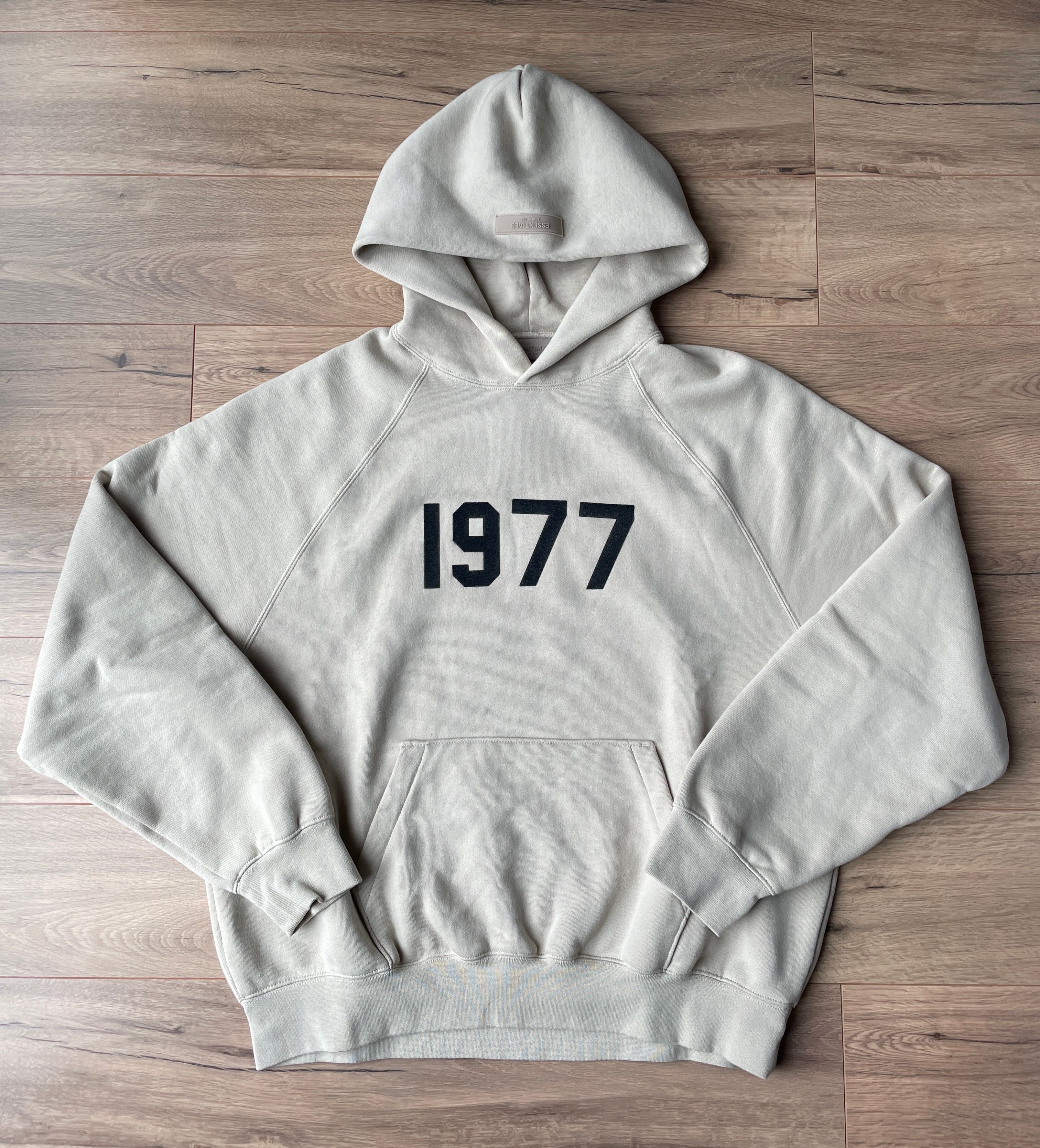 FEAR OF GOD ESSENTIALS 1977 HOODIE "Wheat"