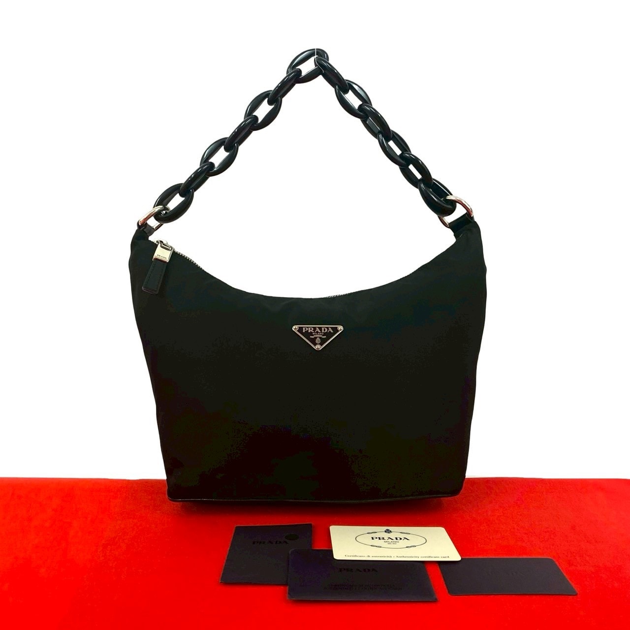 PRADA プラダ 三角ロゴ 金具 ナイロン プラスチック ハンドバッグ ブラック
36557