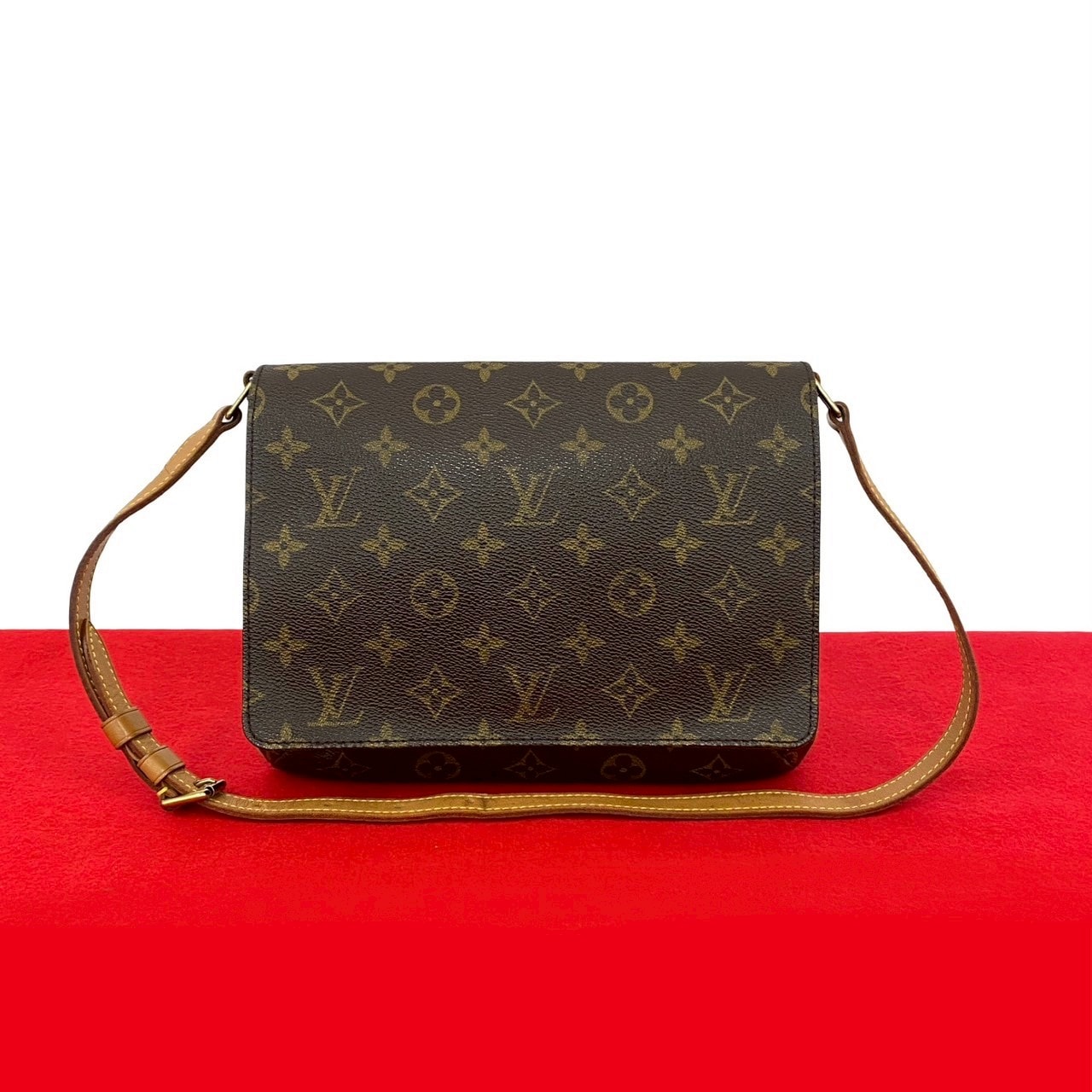 LOUIS VUITTON ルイヴィトン ミュゼット タンゴ モノグラム レザー PVC ショルダーバッグ ブラウン
 27102