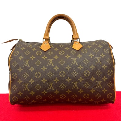 LOUIS VUITTON ルイヴィトン スピーディ 35 モノグラム レザー PVC ハンドバッグ ブラウン
47804