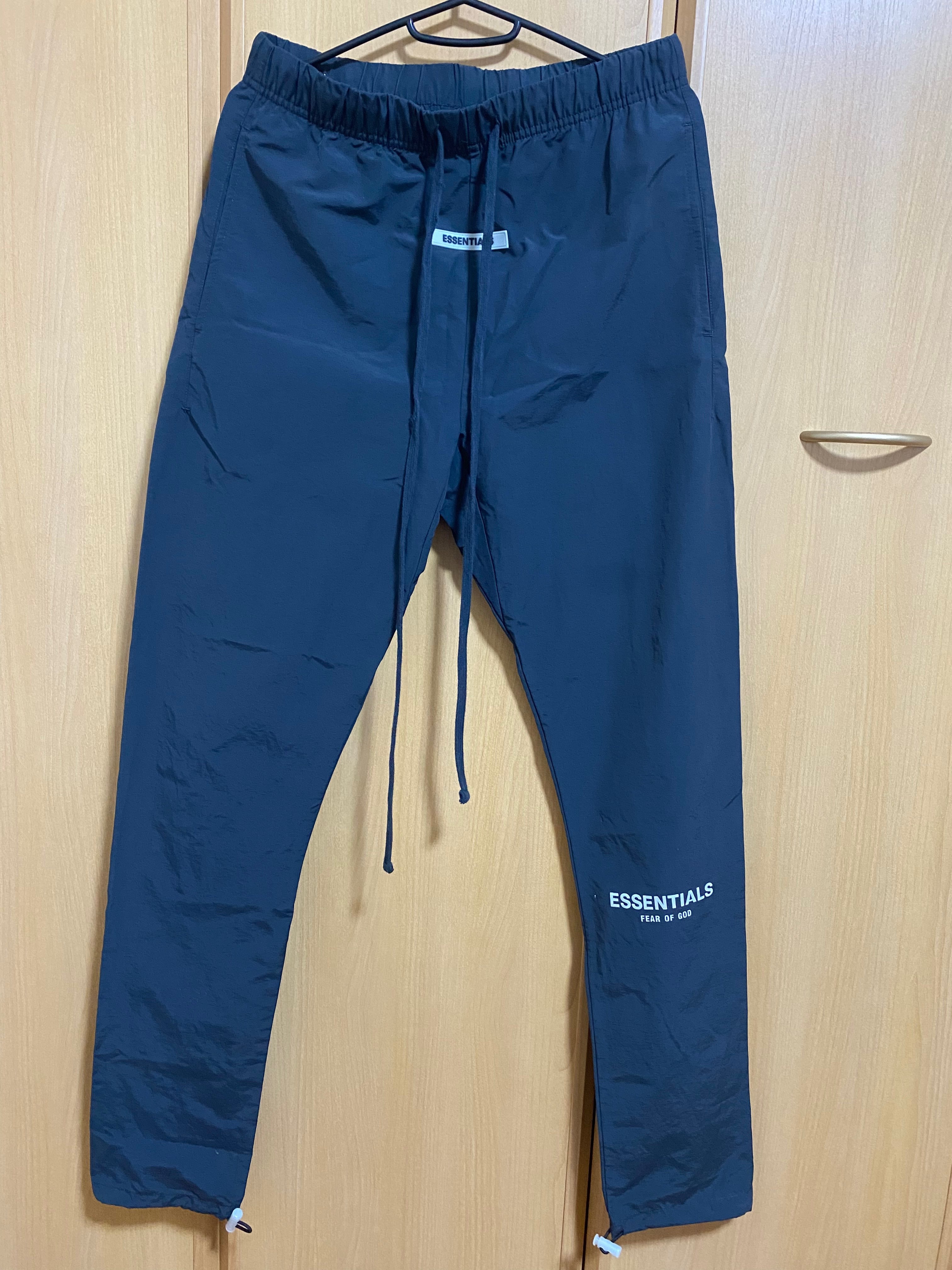 FEAR OF GOD ESSENTIALS Nylon Track Pants "Black"