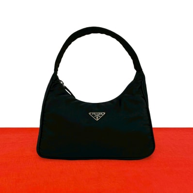 PRADA プラダ 三角ロゴ 金具 ナイロン ハンドバッグ ブラック
74599