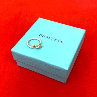 TIFFANY&Co. ティファニー ラブノット シルバー925 K18ゴールド リング・指輪 7号 シルバー
28728