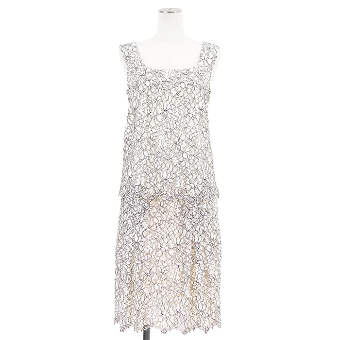 【美品】CHANEL シャネル セットアップ サイズ 36/38 レディース P53157/P53158 トップス スカート カメリア 花柄 総レース ロゴ COCOマーク チャーム ノースリーブ 付属有 オフホワイト ブラック 黒 白 総柄 イタリア製