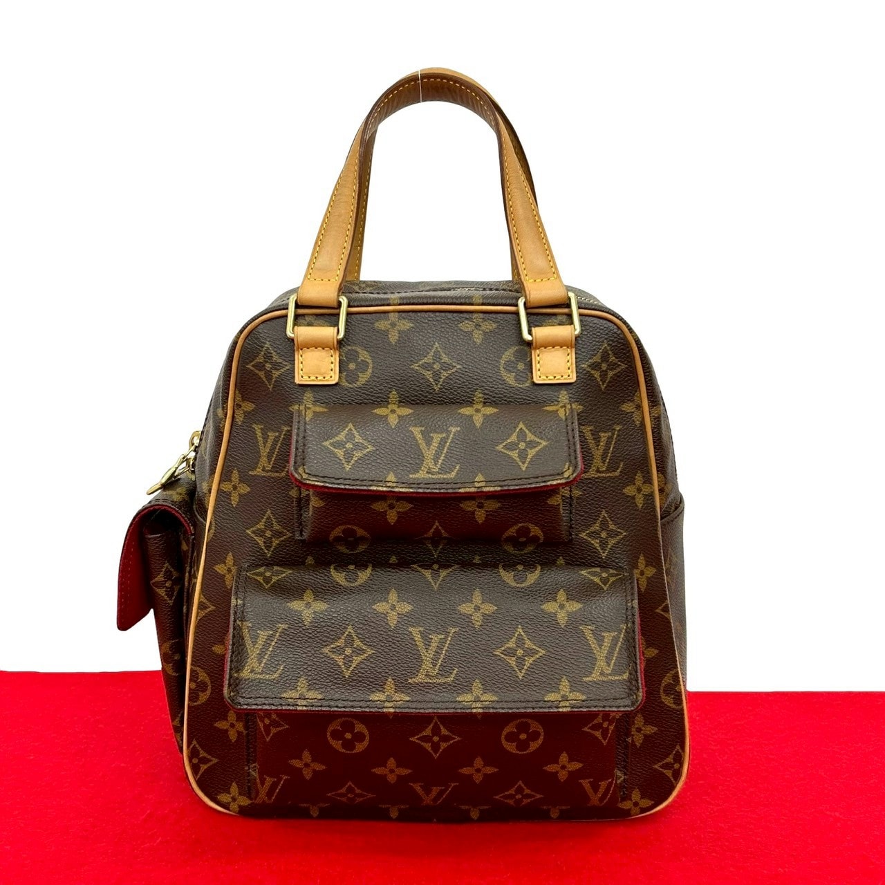 LOUIS VUITTON ルイヴィトン エクサントリ シテ モノグラム レザー PVC ハンドバッグ ブラウン
 48036