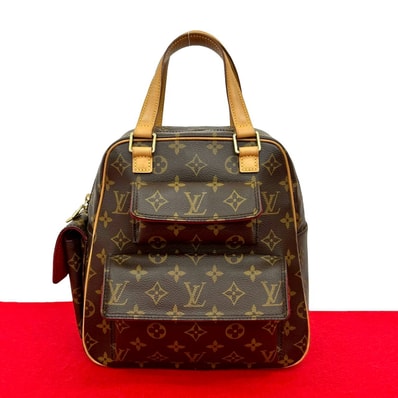 LOUIS VUITTON ルイヴィトン エクサントリ シテ モノグラム レザー PVC ハンドバッグ ブラウン
48036