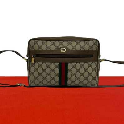 GUCCI グッチ シェリーライン GG ロゴ 金具 PVC レザー ショルダーバッグ ブラウン
79635