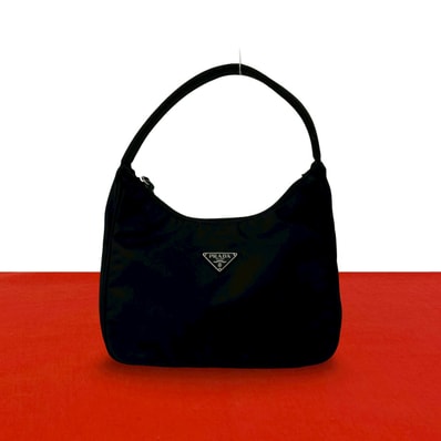 PRADA プラダ 三角ロゴ 金具 ナイロン ハンドバッグ ブラック
54385