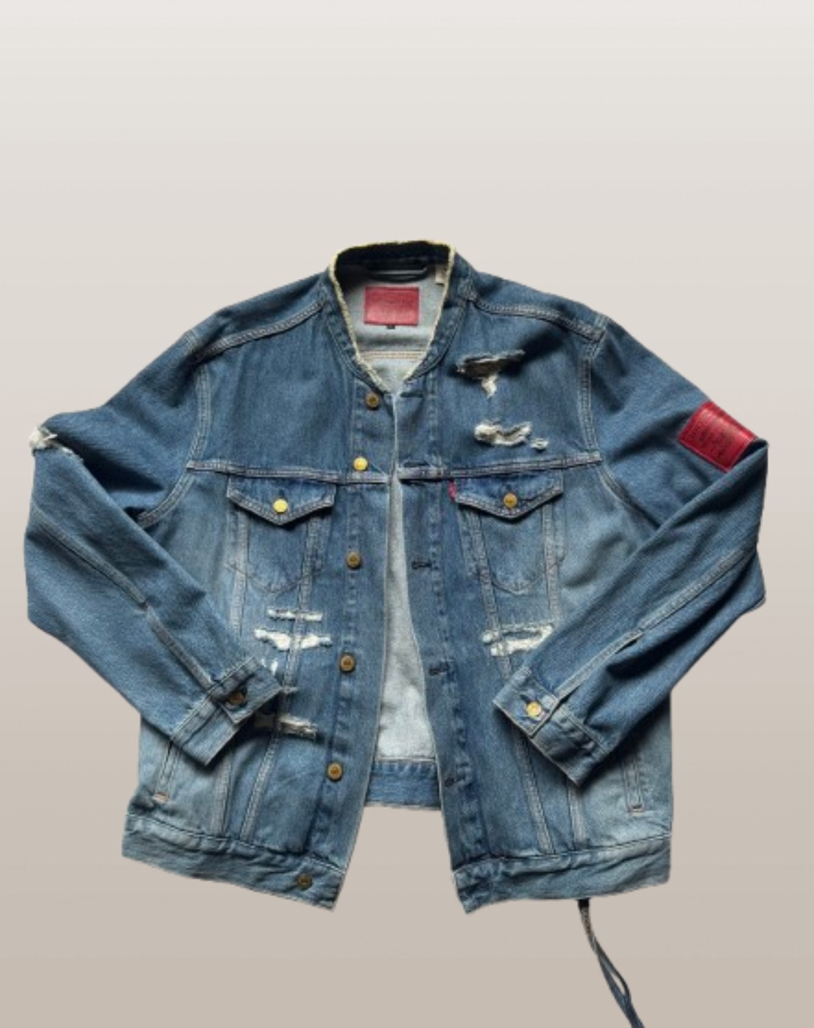 Kith x Levi’s Strawberry Fields Patched Trucker Jacket Washed Blue