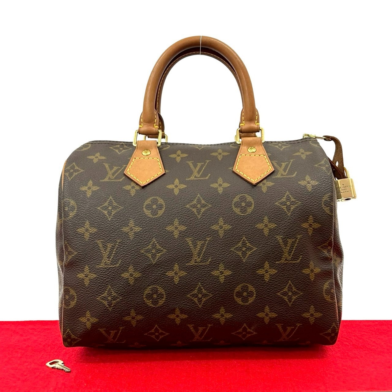 LOUIS VUITTON ルイヴィトン スピーディ 25 モノグラム レザー PVC ハンドバッグ ブラウン
 369-6