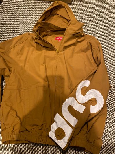 Supreme Spellout Track Jacket "Dark Gold"