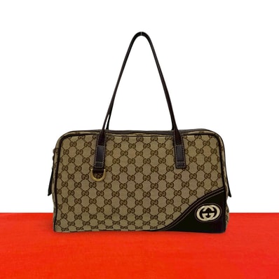 GUCCI グッチ GG ロゴ 柄 金具 キャンバス レザー ショルダーバッグ ブラウン
42637