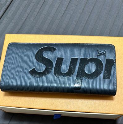 Supreme / Louis Vuitton Epi Portefeuille Brazza "Noir"