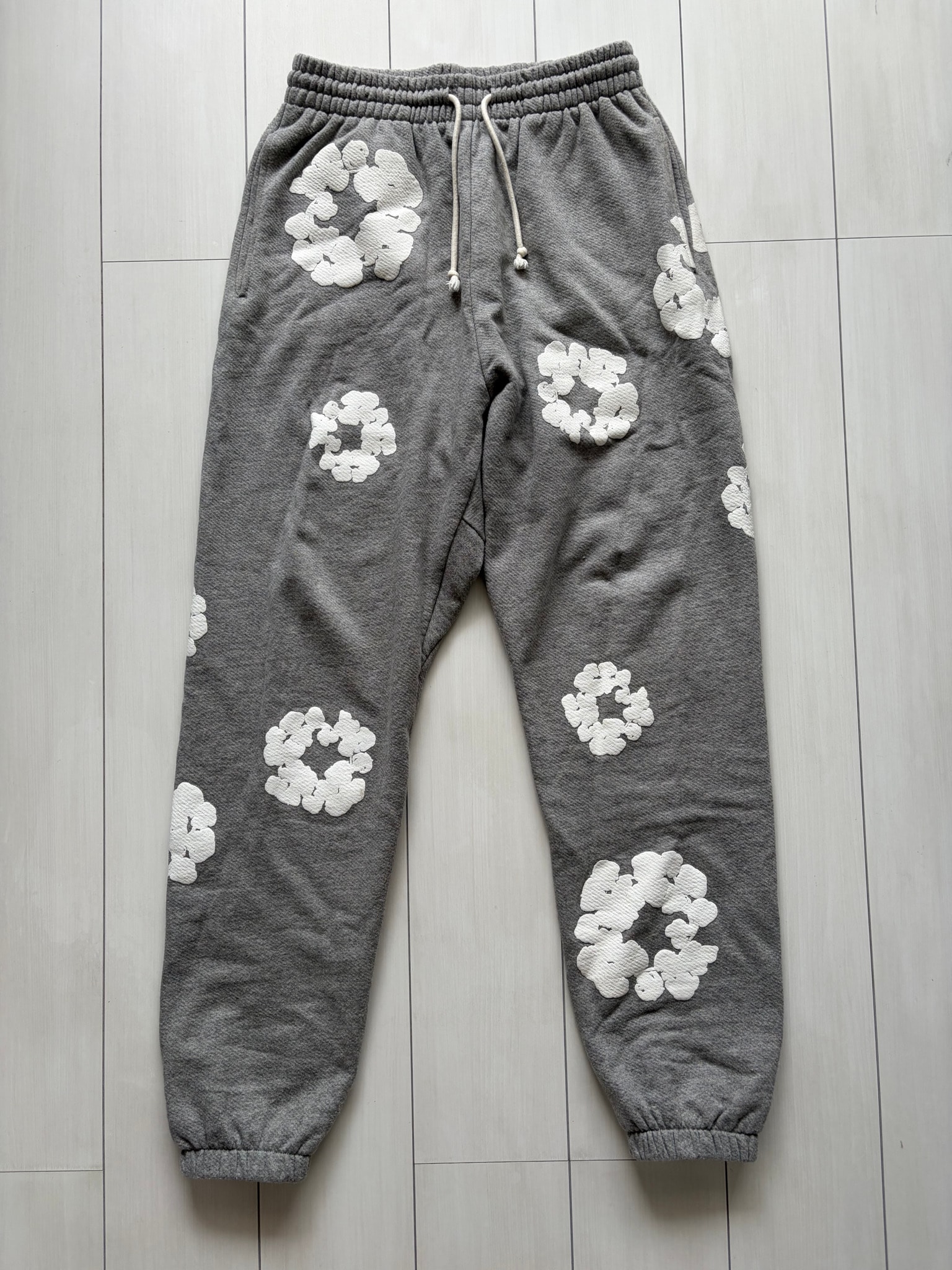 DENIM TEARS The Cotton Wreath Sweat Pants "Grey"