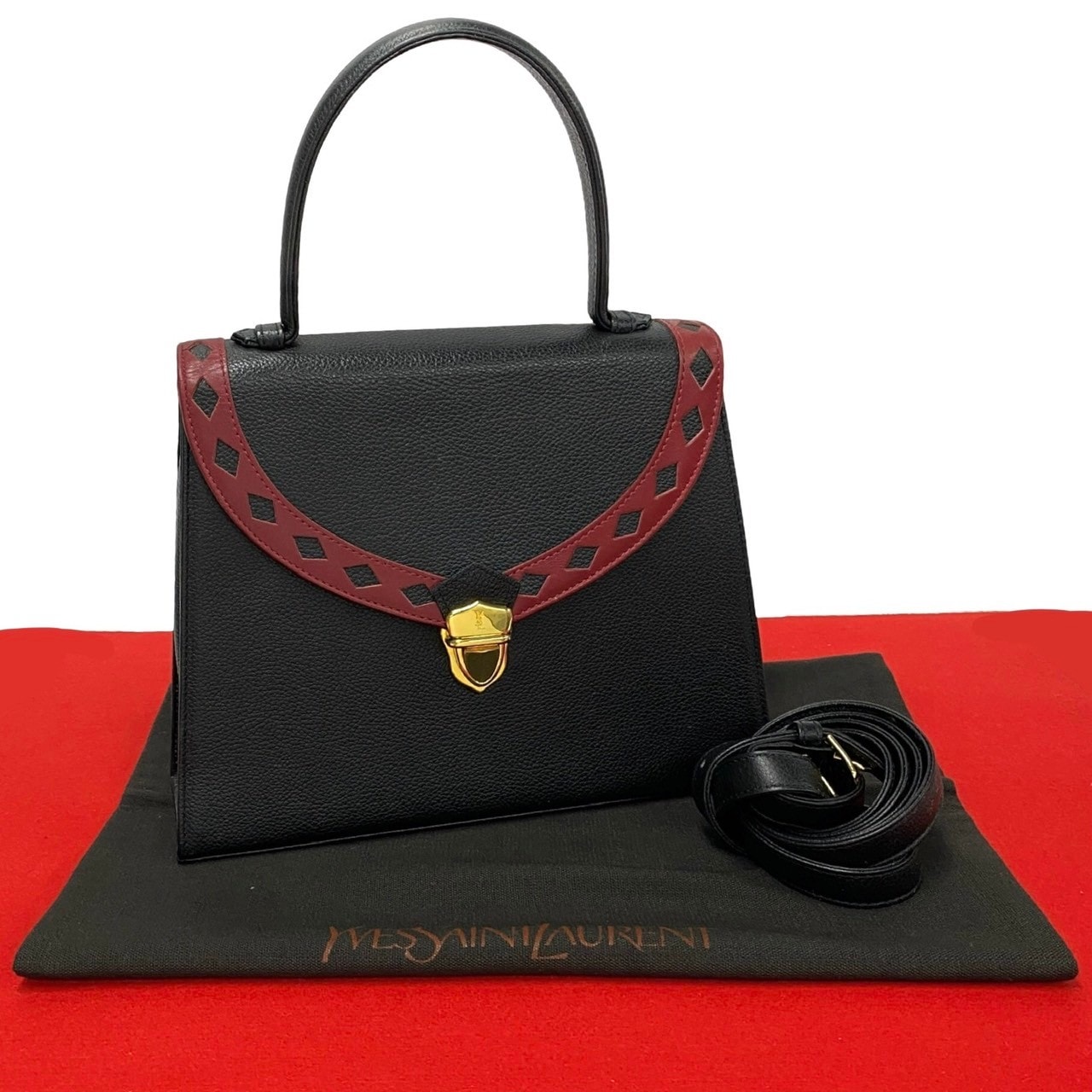 YVES SAINT LAURENT イヴ・サンローラン YSL ロゴ カットアウト パンチング レザー レザー ショルダーバッグ ブラック
44124