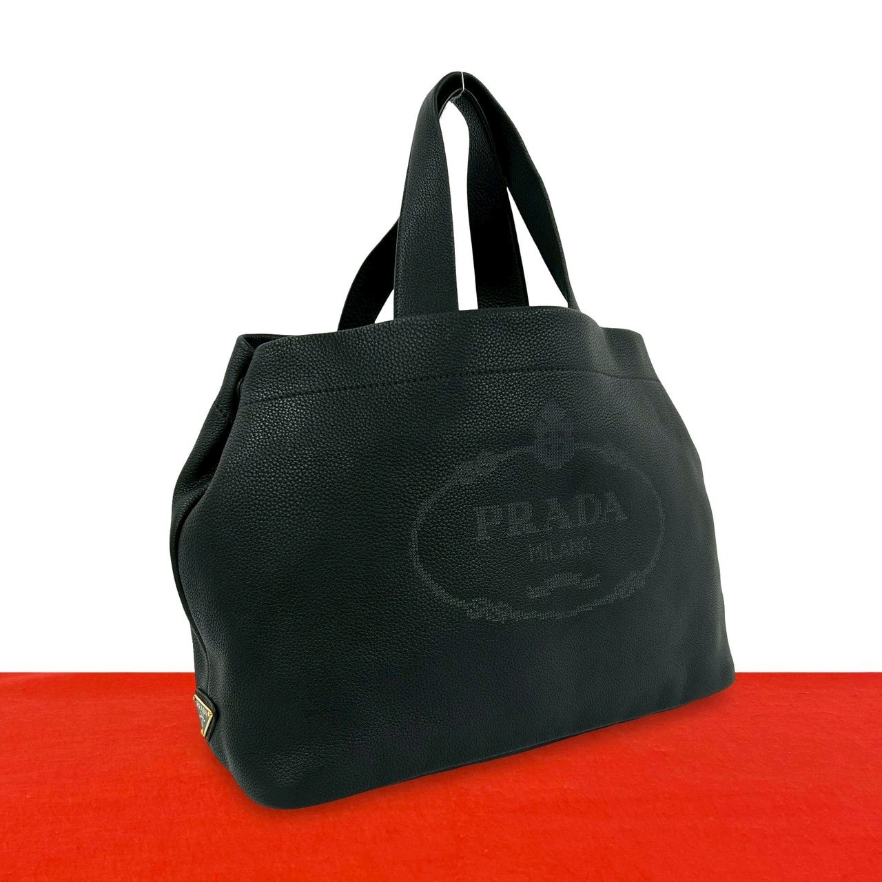 PRADA プラダ 三角ロゴ 金具 パンチング レザー ハンドバッグ ブラック
 77268
