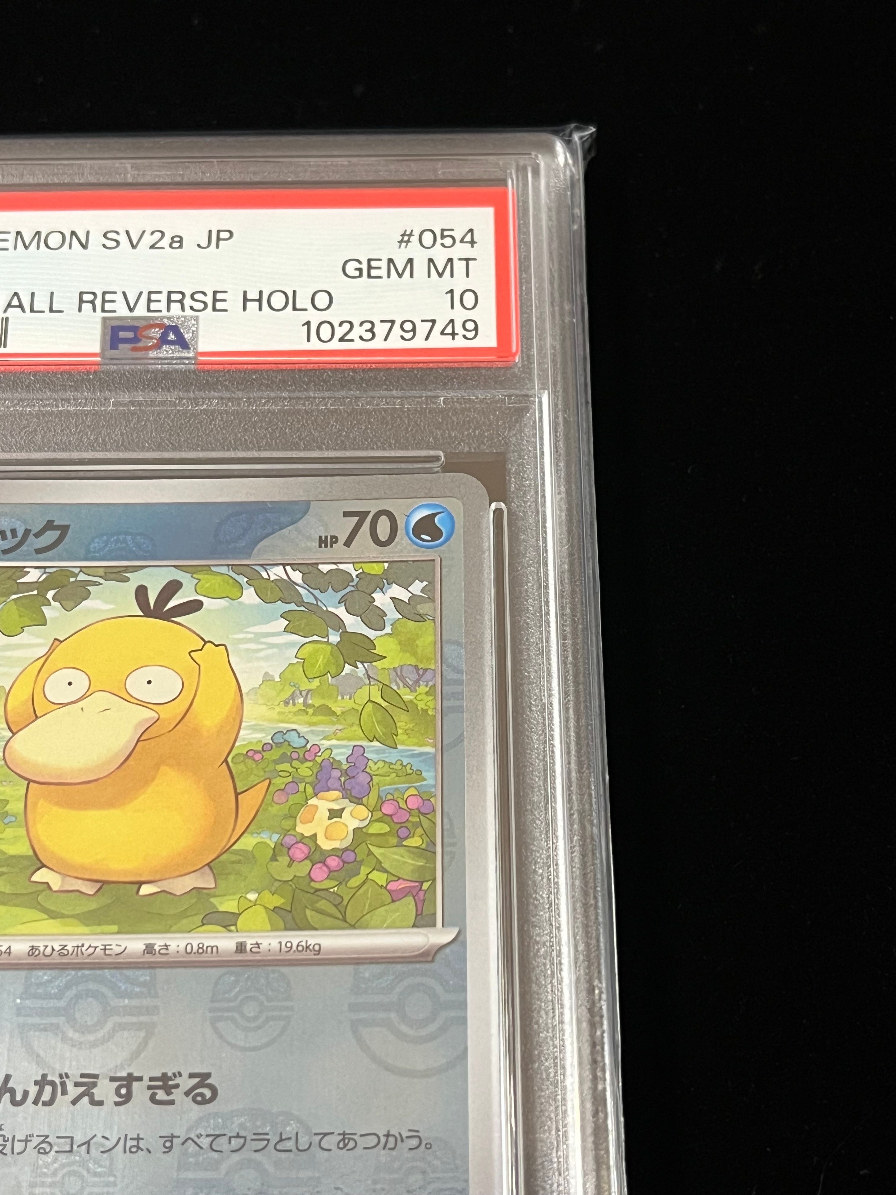 pokemon card sandygast 2000 Pokemon Rocket #65 Psyduck 1st Edition PSA 9 main image 0