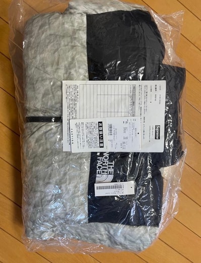 Supreme x The North Face Nuptse Jacket "White Paper Print"