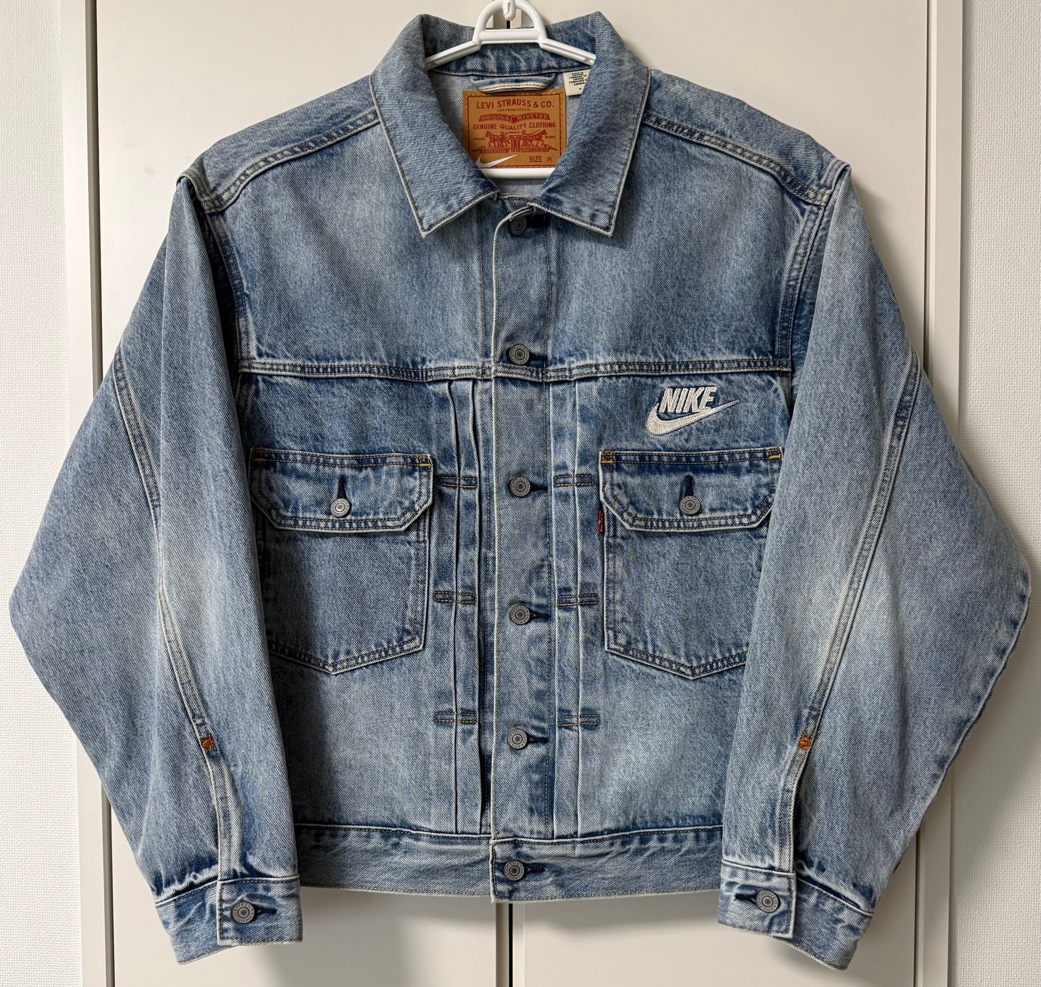 Levi's x Nike Denim Trucker Jacket "Light Indigo" 002TM-0000