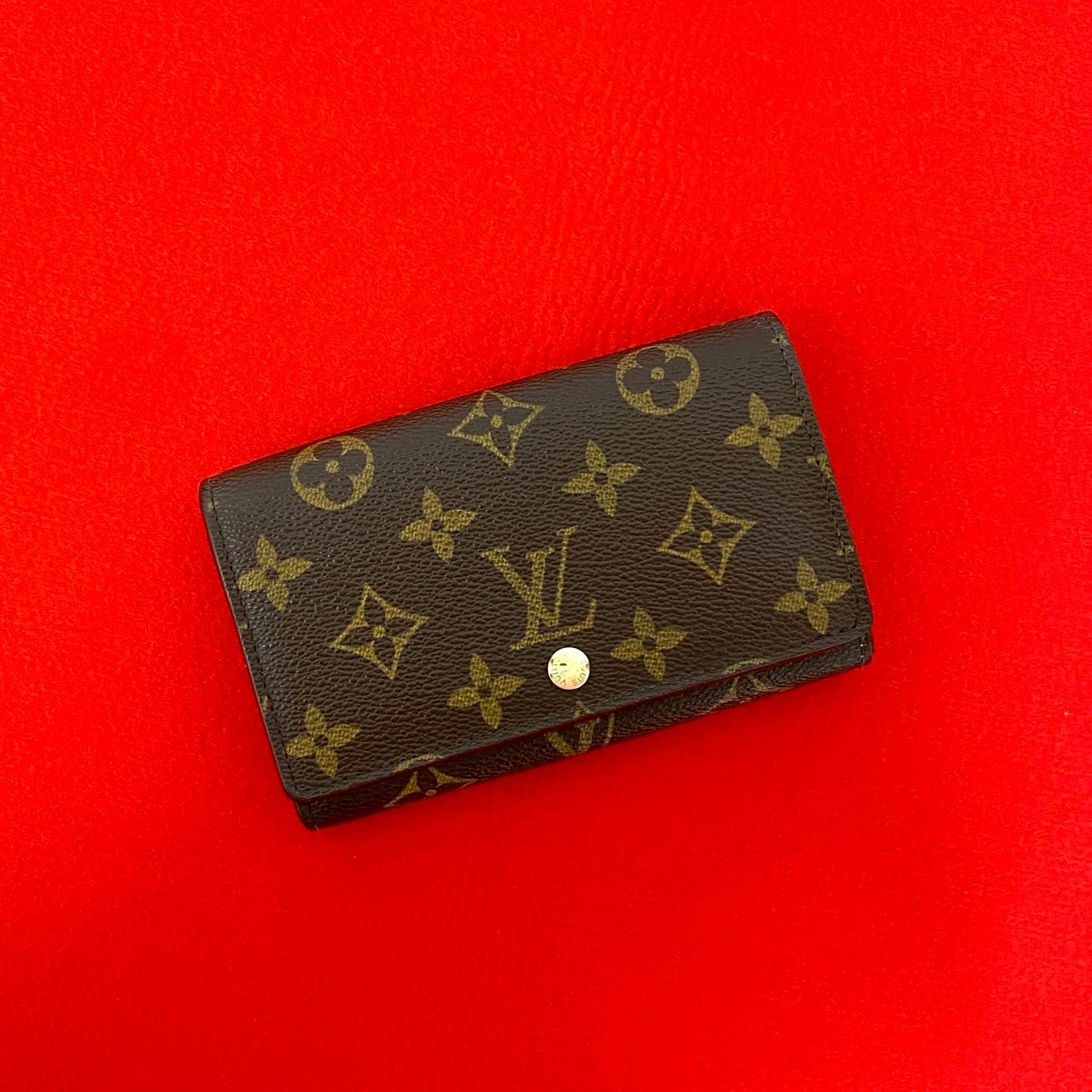 LOUIS VUITTON ルイヴィトン ポルトモネ ビエ トレゾール モノグラム レザー PVC 二つ折り財布 ブラウン
 42131