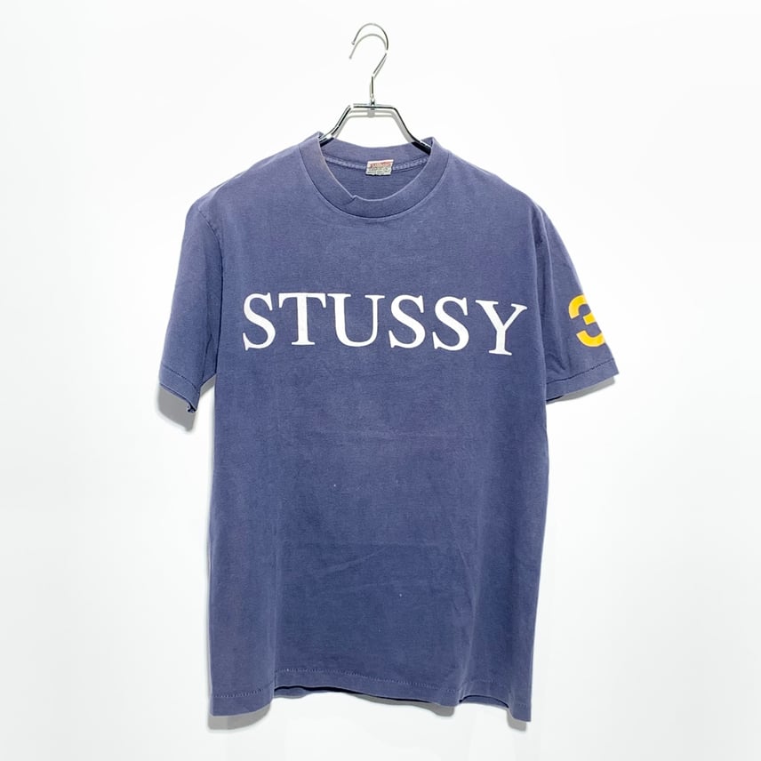 C (やや傷や汚れあり)】Stussy 90's old Logo Tee Navyの古着・中古 C (やや傷や汚れあり)】Stussy 90's old Logo Tee Navyの古着・中古