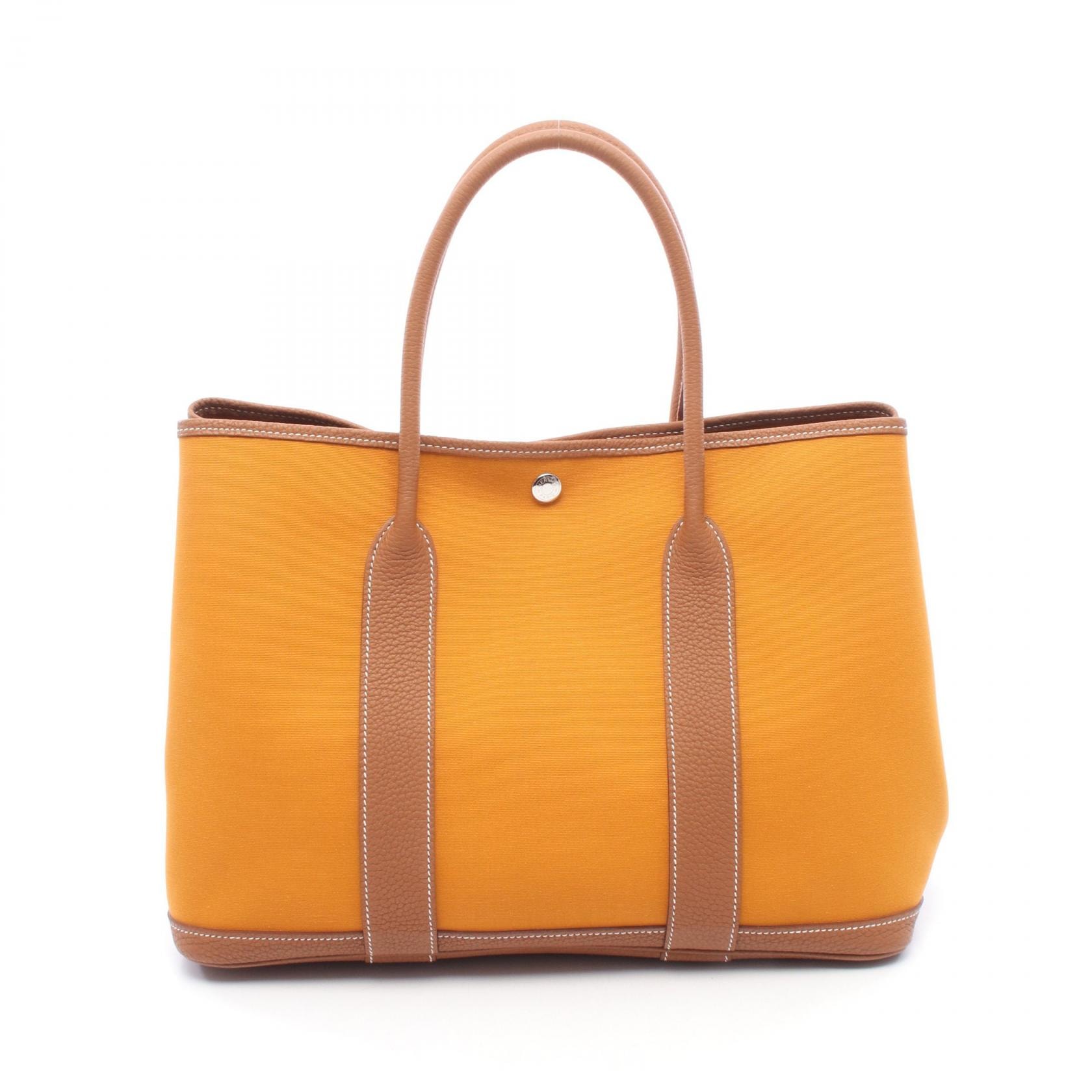エルメス HERMES ガーデンパーティPM サフラン ゴールド トートバッグ バッグ キャンバス レザー ネゴンダ トワルオフィシエ サフラン C刻印(2018年製造) レディース オレンジ系 / ブラウン系 【中古】