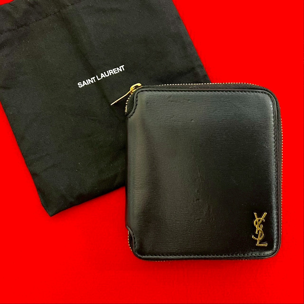 SAINT LAURENT PARIS サンローランパリ ロゴ 金具 レザー 二つ折り財布 ブラック
76338