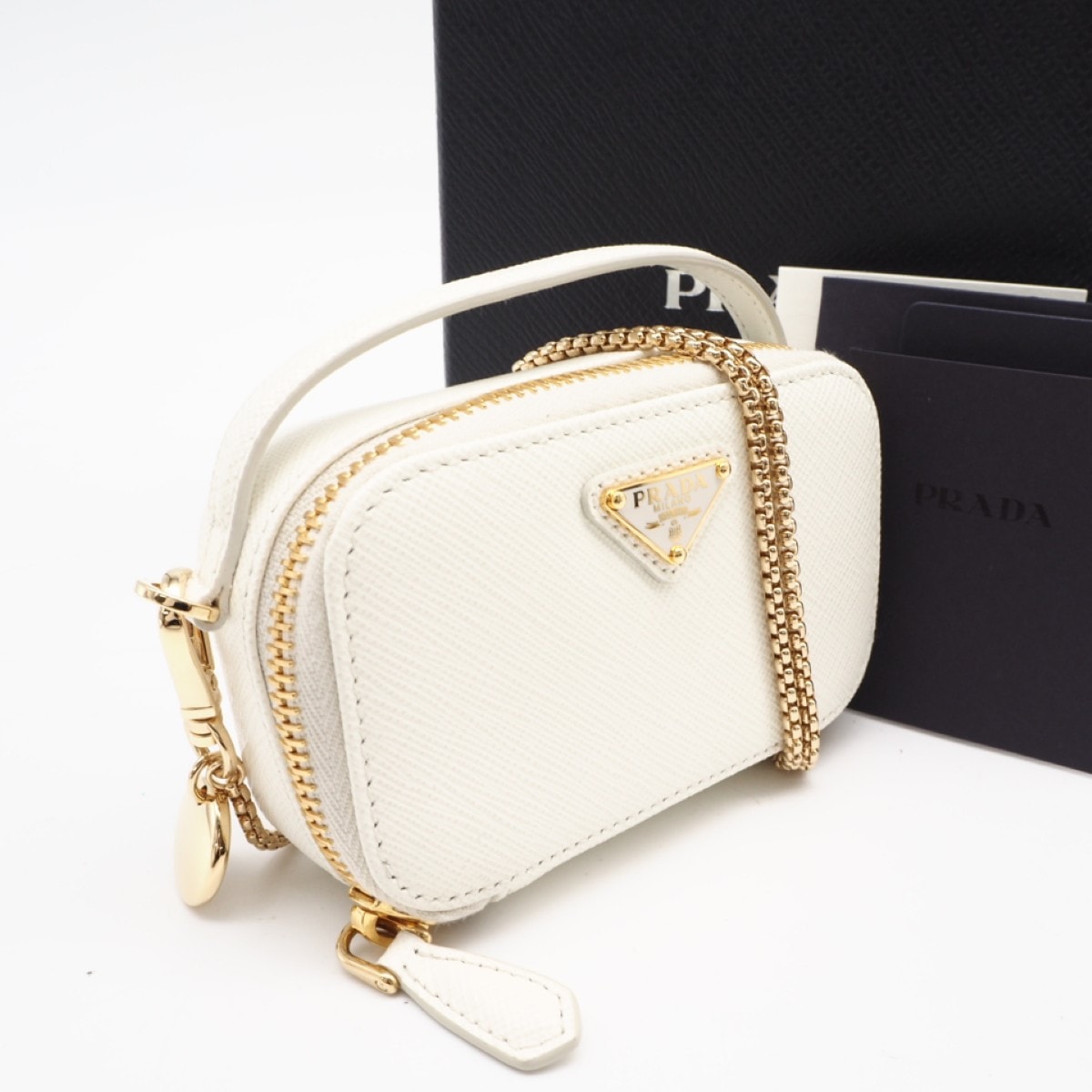 未使用 PRADA プラダ サフィアーノ トライアングル ミニポーチ 1NR025 2wayショルダーバッグ ホワイト サフィアーノ レディース