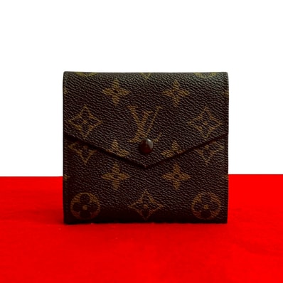 LOUIS VUITTON ルイヴィトン ポルト モネ ビエカルディ モノグラム レザー PVC 三つ折り財布 ブラウン
63626