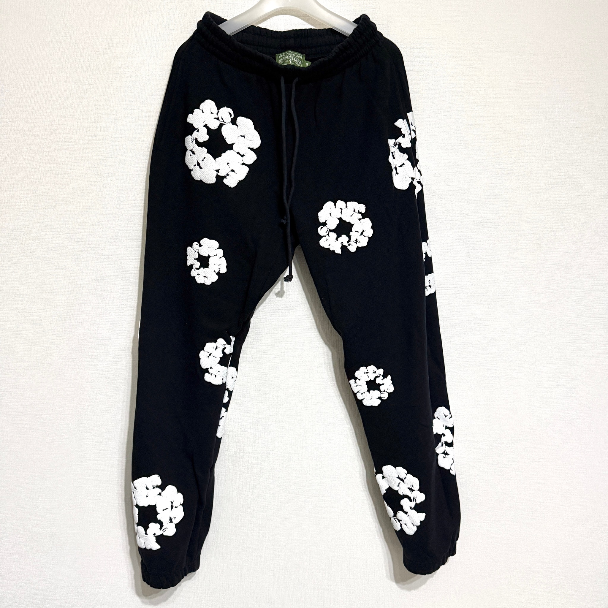 DENIM TEARS Cotton Wreath Sweatpants "Black"