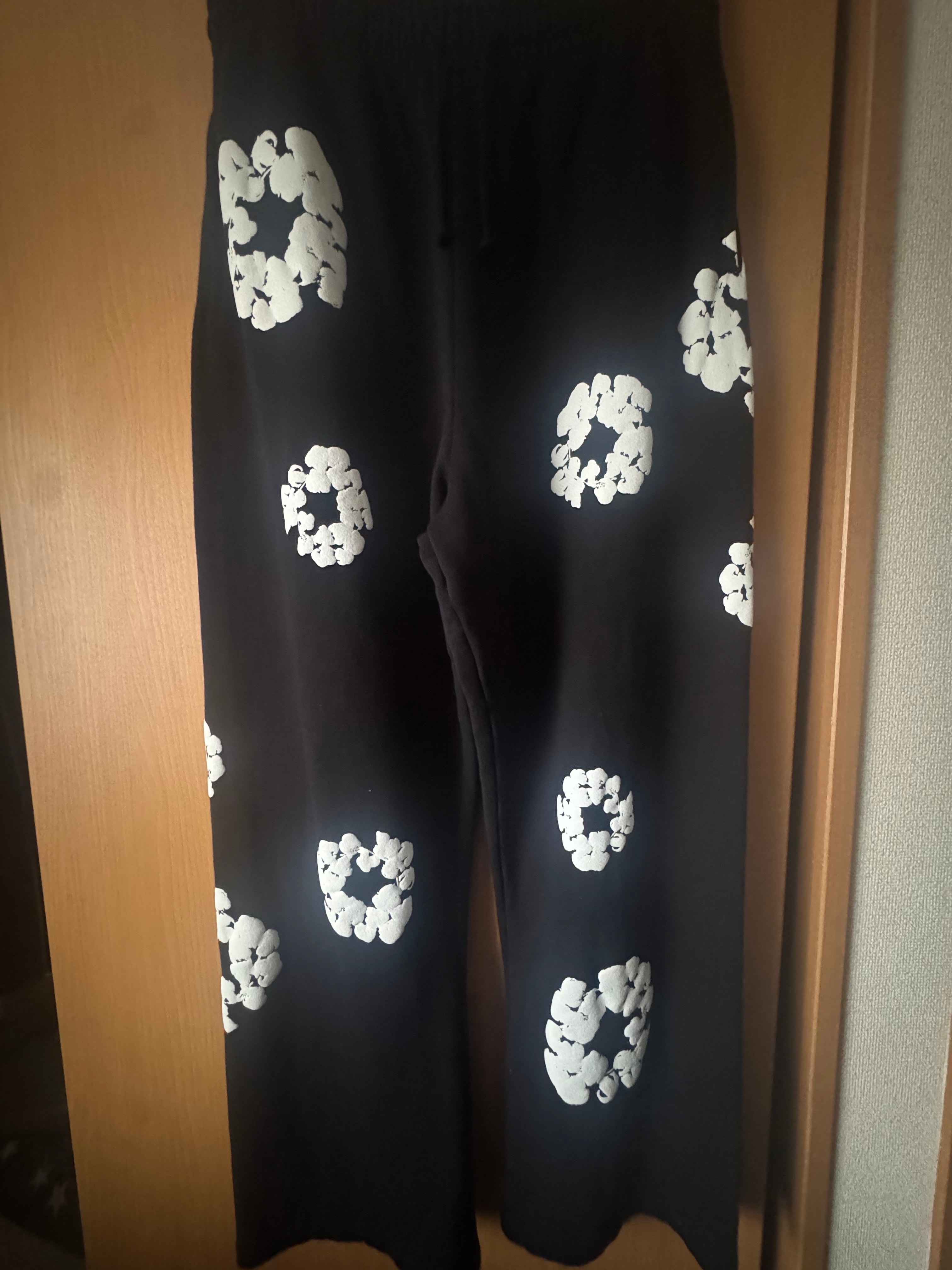 DENIM TEARS Cotton Wreath Baggy Sweatpants "Black"