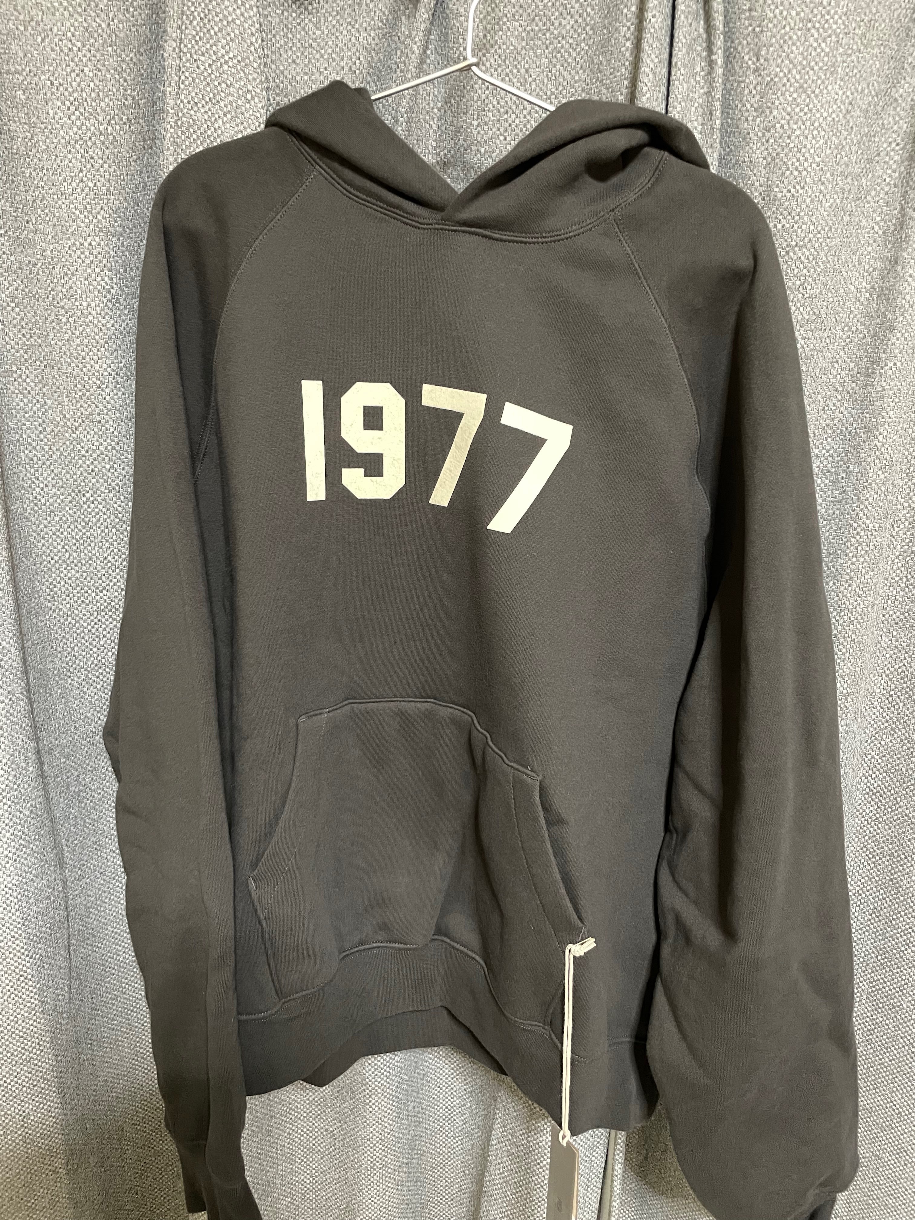 FEAR OF GOD ESSENTIALS 1977 HOODIE "Iron"