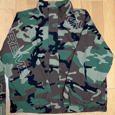 Supreme Spellout Embroidered Ripstop Track Jacket "Woodland Camo"