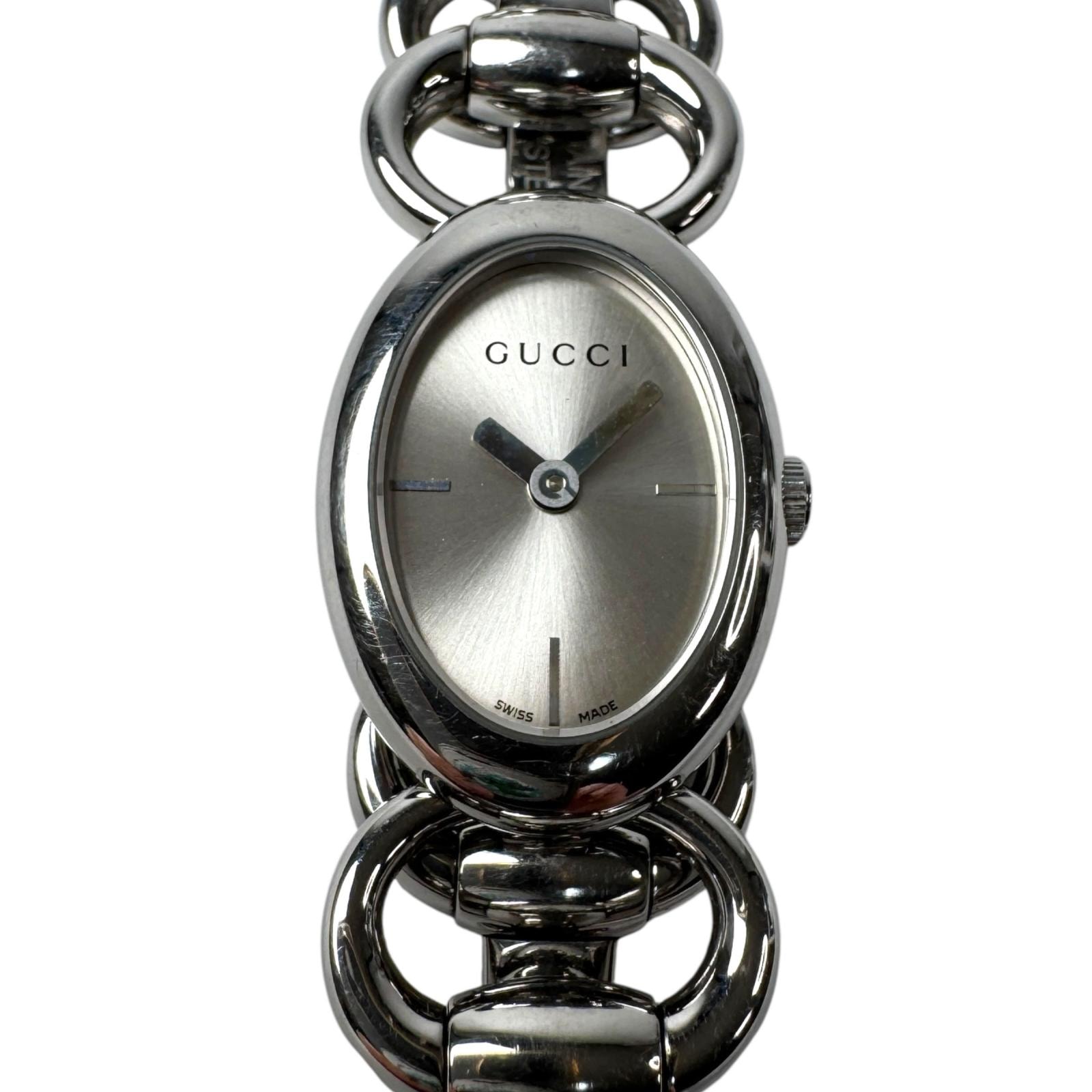 グッチ GUCCI 118 トルナヴォーニ 腕時計 シルバー クォーツ オーバル 稼働品 レディース