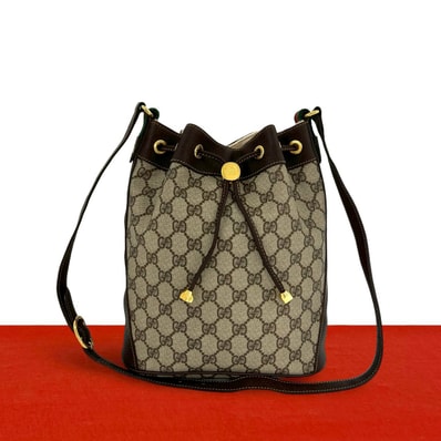 GUCCI グッチ シェリーライン GG ロゴ 金具 巾着 レザー PVC ショルダーバッグ ブラウン
92820