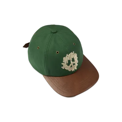 DENIM TEARS Peace Wreath Leather Brim Cap "Rifle Green"