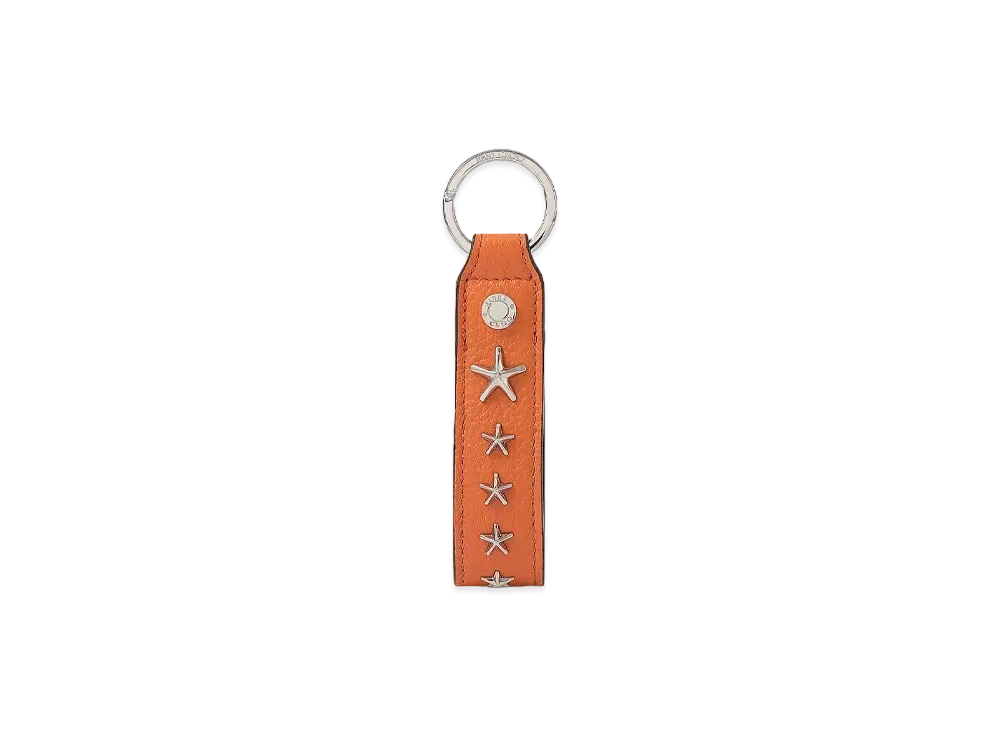 新品・箱付き【ジミーチュウ】スタッズ付きキーリング オレンジカラー B (目立った傷や汚れなし)】JIMMY CHOO（ジミーチュウ）JCロゴ ライン