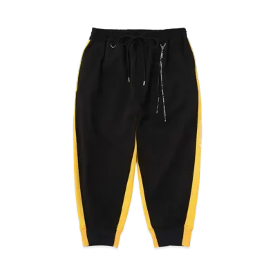 mastermind WORLD Cropped Track Pants "Black Yellow"