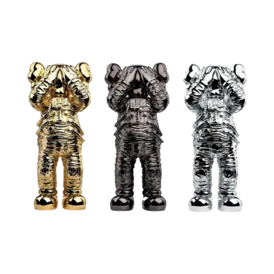 KAWS Holiday Space Figure Gold/Black/Silver Set