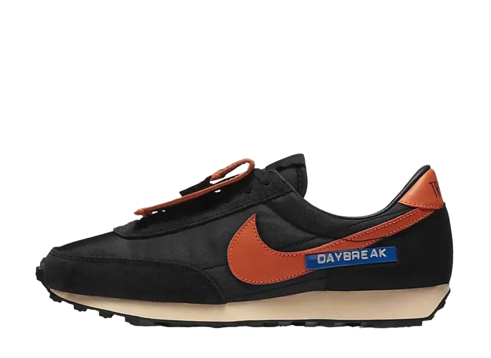 NIKE Women's DAYBREAK "BLACK/STARFISH"