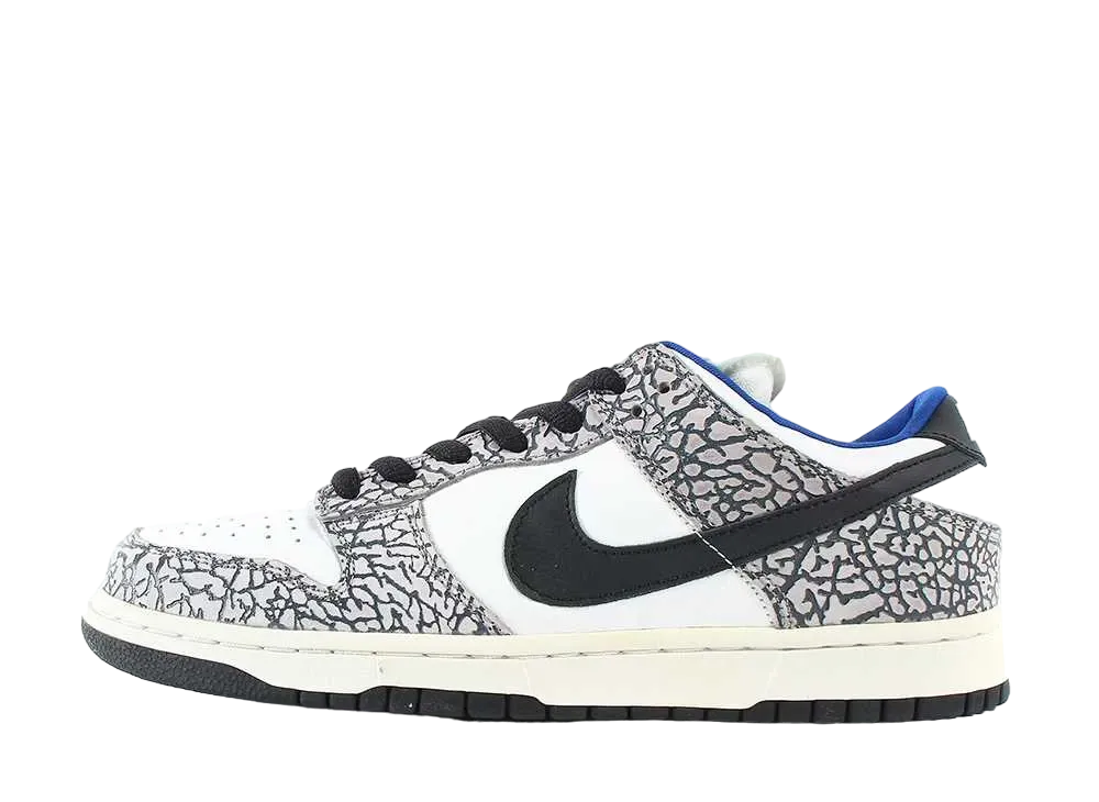 Supreme × Nike SB Dunk Low "White Cement/Safari" (2002)