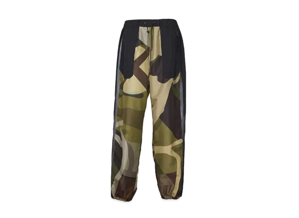 sacai KAWS Track Pants "Camo"