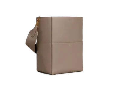 CELINE Sangle Bucket Bag in Soft Grained Calfskin "Taupe"
