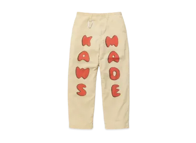 HUMAN MADE x KAWS CORDUROY PRINT PANTS "Beige"
