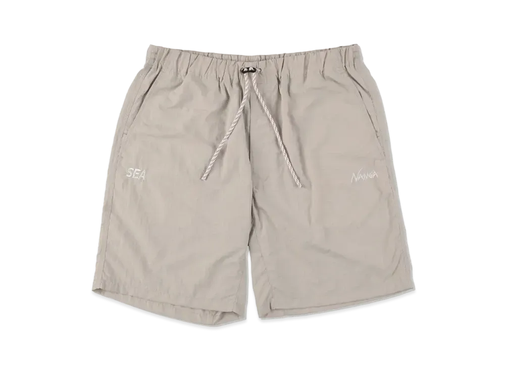 WIND AND SEA x NANGA NYLON TUSSER SHORTS "Ivory"