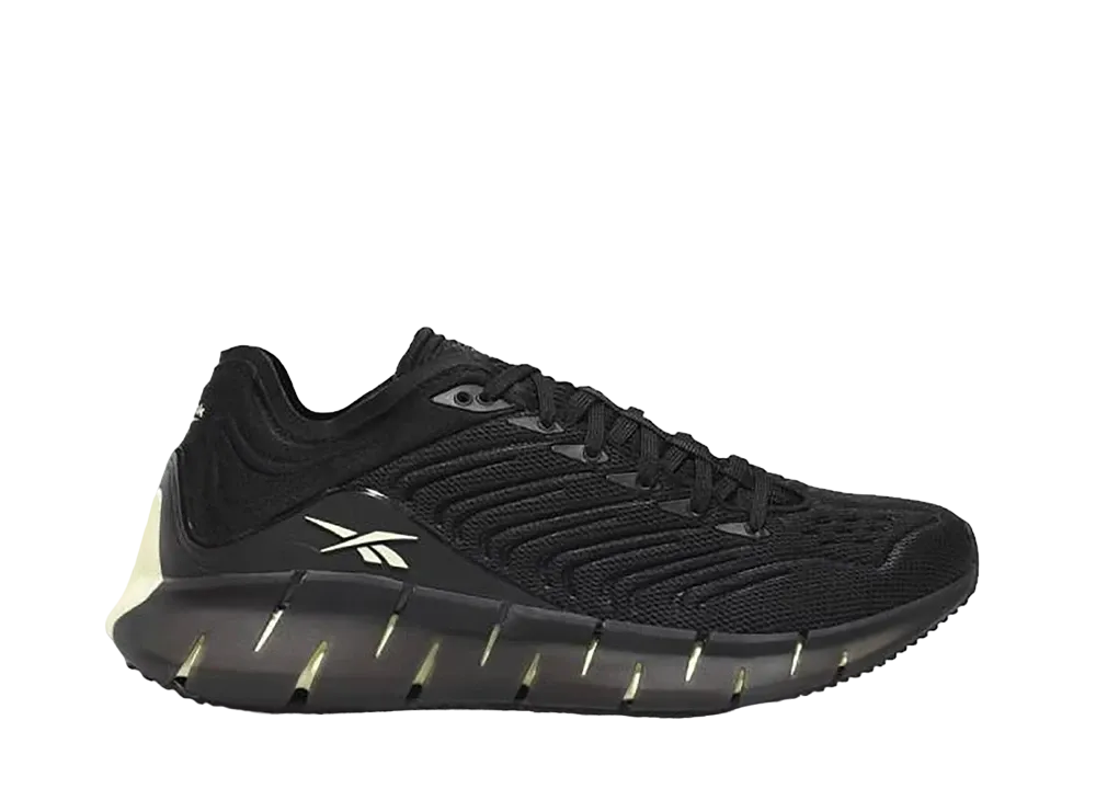 リーボック ウィメンズ ジグ キネティカ "ブラック シトラス グロー"