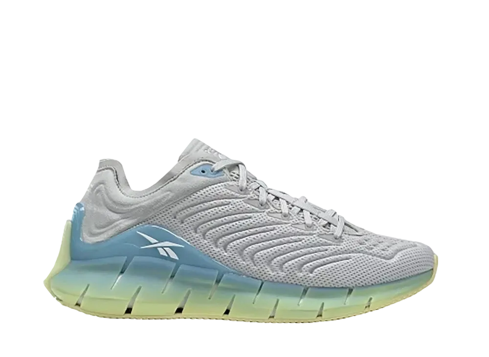 リーボック ウィメンズ ジグ キネティカ レモン "グロー フルード ブルー"