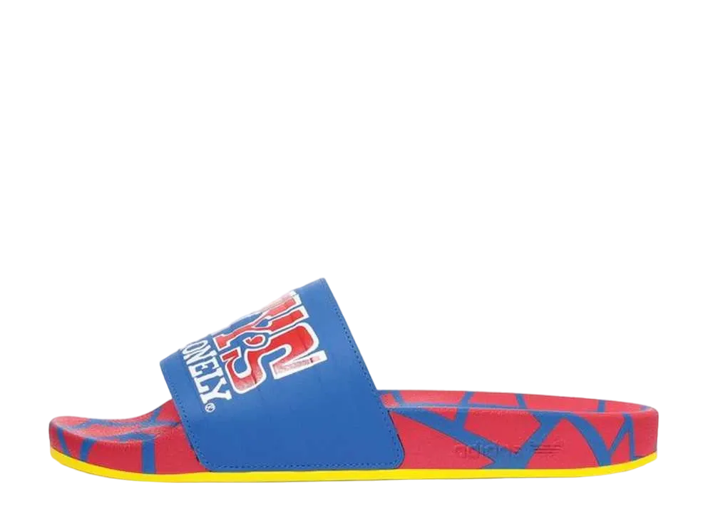 トニーズチョコロンリー × アディダス アディレッタ "ブルーバード/ヴィヴィッド レッド/フットウェア ホワイト"