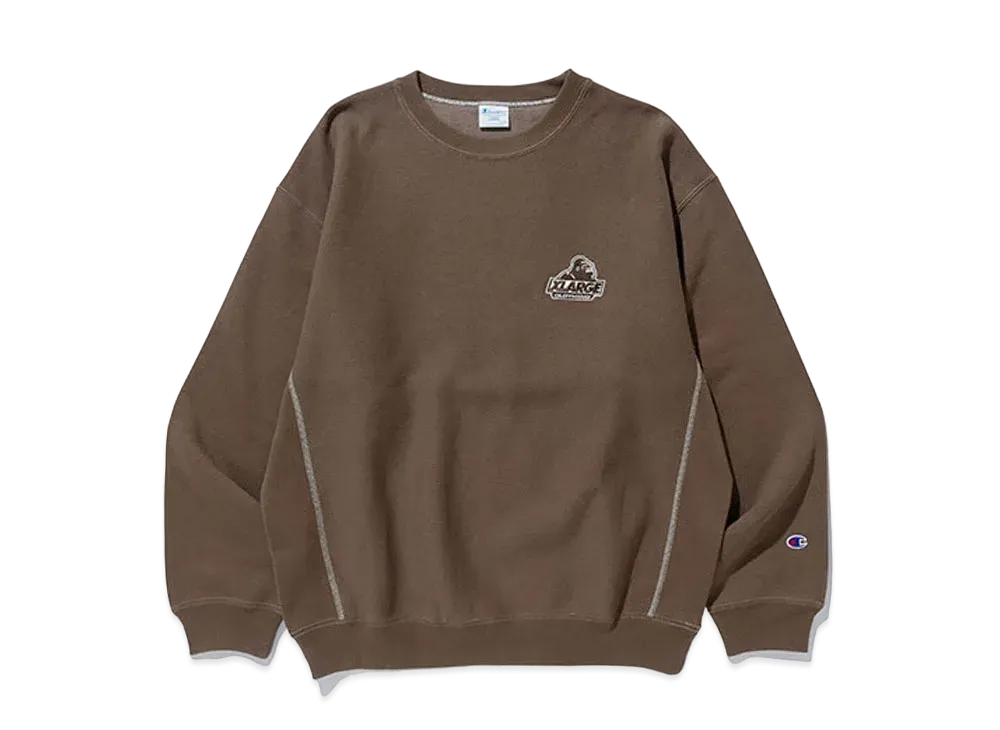 XLARGE x Champion Reverse Weave Overdye Crewneck Sweat "Brown"