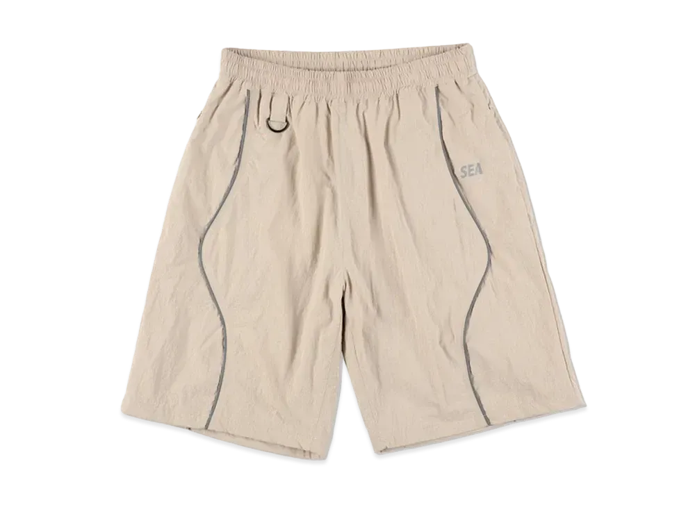 WIND AND SEA Reflective Piping Baggy Track Short "Sand"